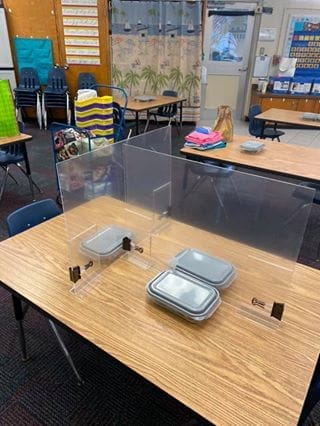 teacher created Plexiglas dividers for students to use when in small groups